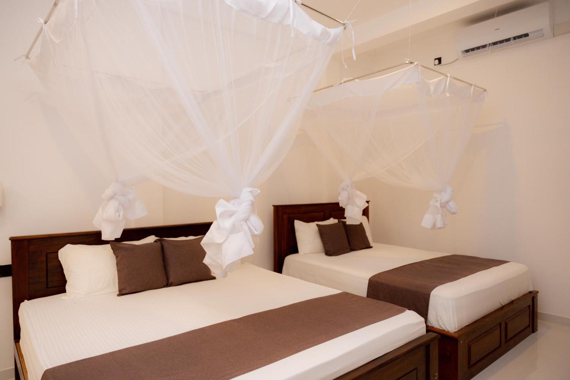 Sea Bay Inn แทนกาลเล ภายนอก รูปภาพ